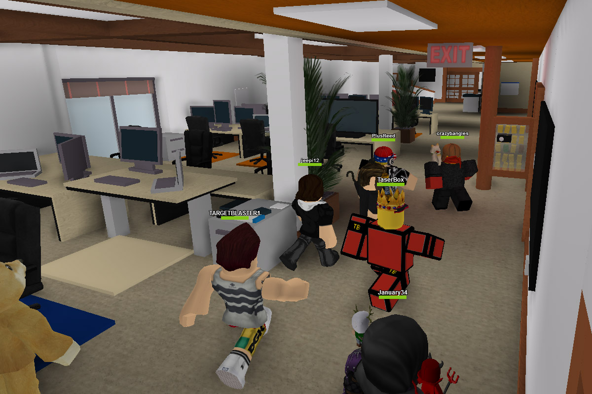 Players running through the virtual Roblox headquarters